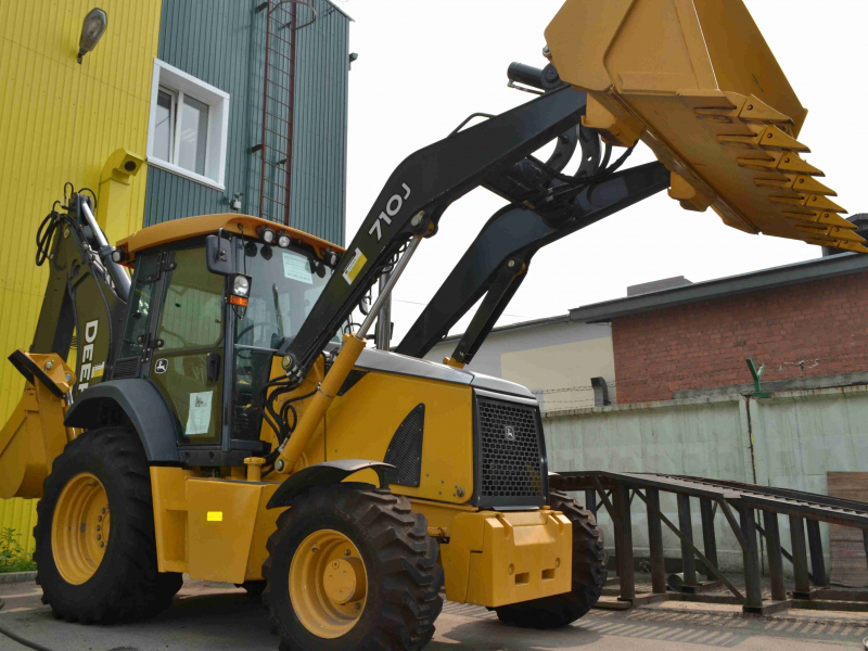 Джон дер. John Deere 710j. Экскаватор погрузчик 710 Джон Дир. Экскаватор погрузчик John Deer. John Deere 9000 погрузчик.